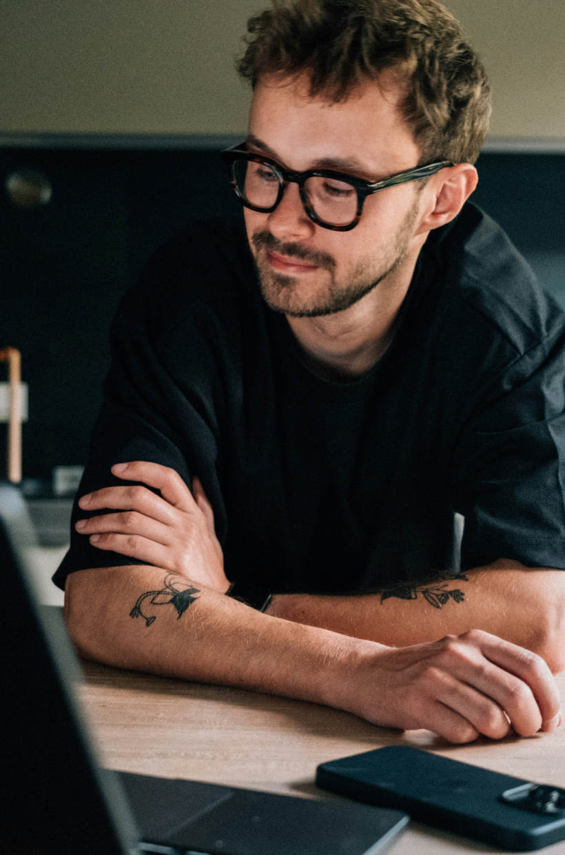 Person reviewing work on a laptop